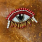 Broche Big Eye rouge