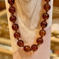 Collier Boule marron